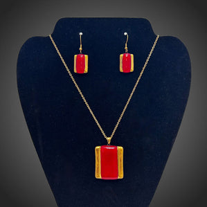 Set Arte sklenený červeno zlatý oblžnik.